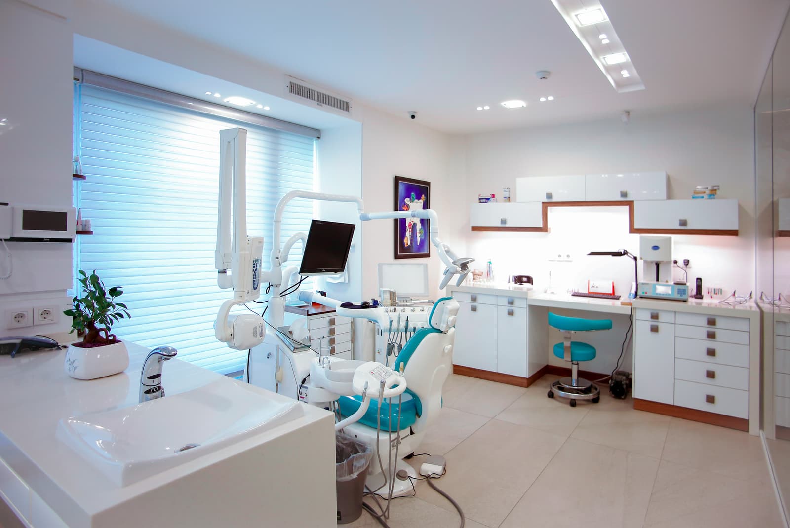 Modern dental suite with advanced equipment and comfortable patient chair